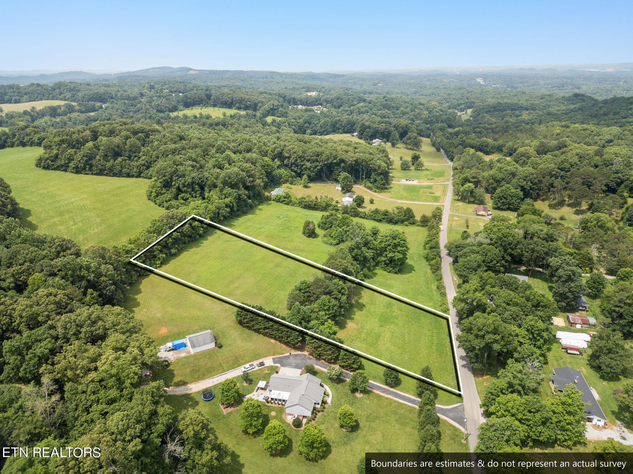 10140 Stringtown Road Strawberry Plains, TN 37871 - Photo 2 of 32 5-web-or-mls-DJI_0792 - white line bound