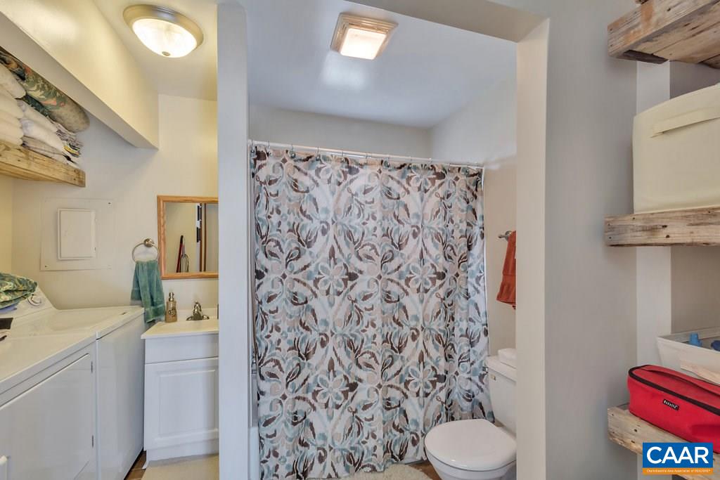 782 West Daffodil Road Ruckersville, VA 22968 - Photo 11 of 18 a bathroom with a sink toilet and shower