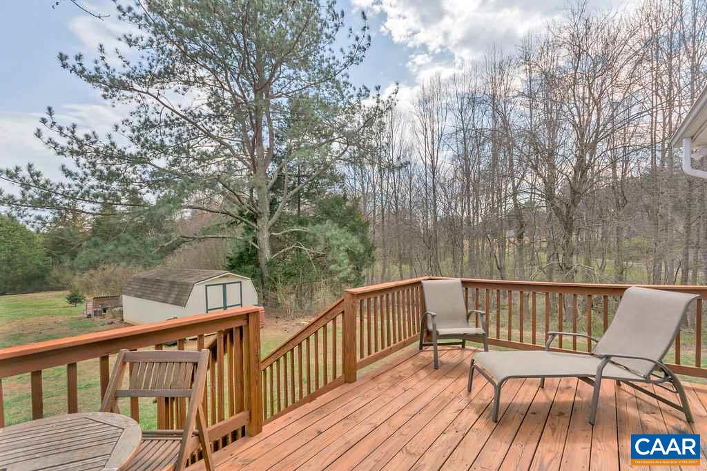 782 West Daffodil Road Ruckersville, VA 22968 - Photo 14 of 18 a view of deck with furniture and trees