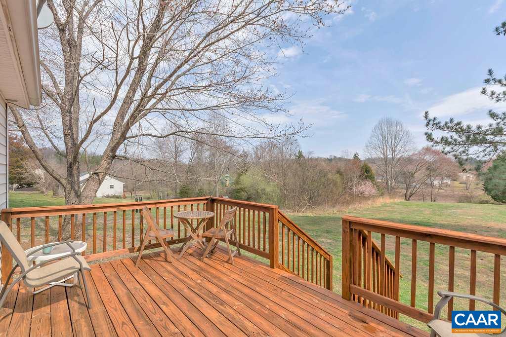 782 West Daffodil Road Ruckersville, VA 22968 - Photo 2 of 18 a view of roof deck with wooden floor and fence