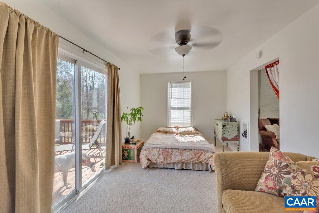 782 West Daffodil Road Ruckersville, VA 22968 - Photo 7 of 18 a bedroom with furniture and a large window