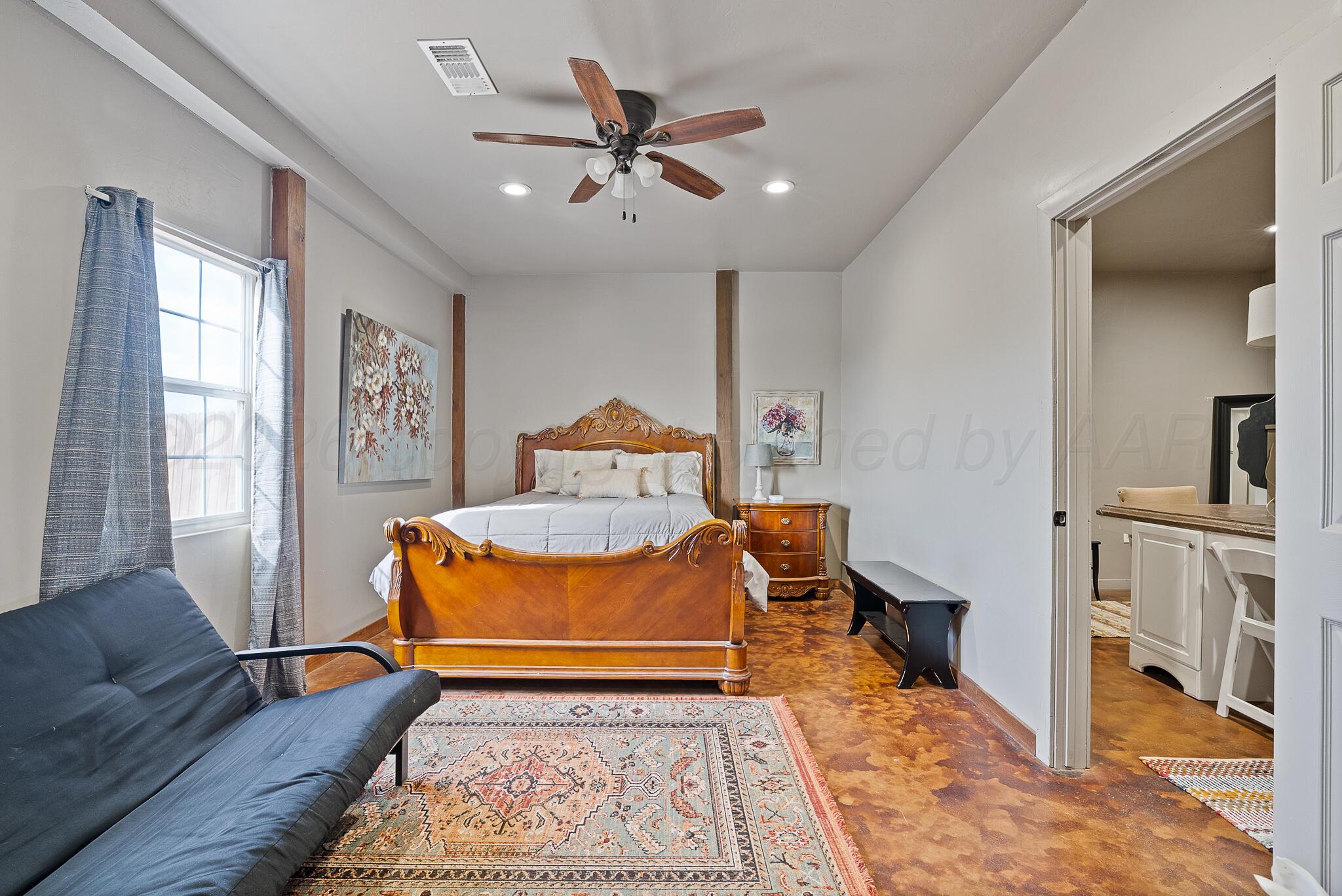 19000 Spirit Loop Amarillo, TX 79119 - Photo 69 of 86 a bedroom with furniture and a rug