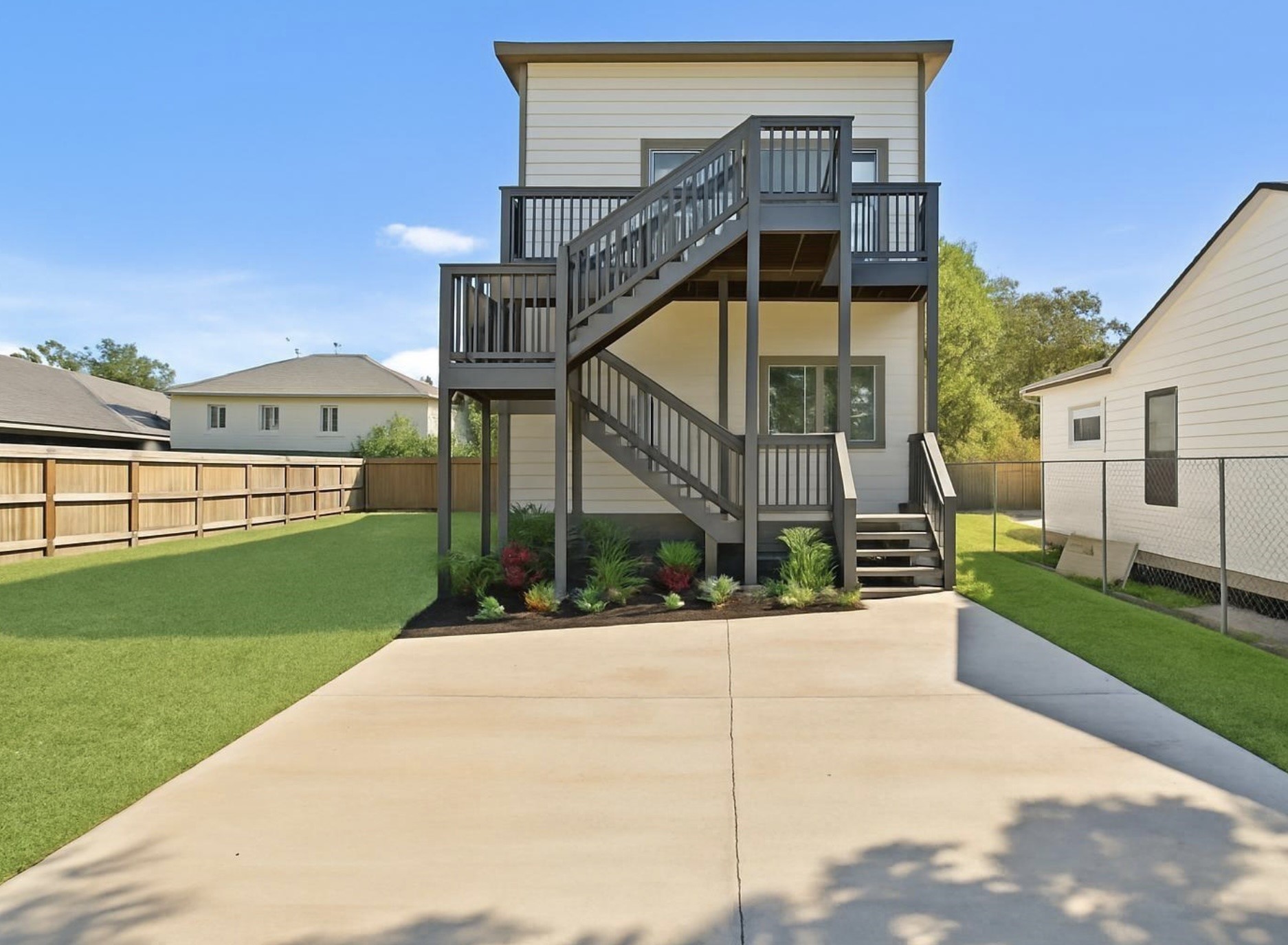 8204 Tower Street Houston, TX 77088 - Photo 24 of 24 a view of a brick house with a small yard and plants