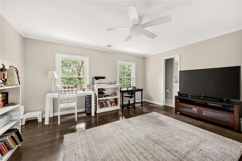 3650 Dumbarton Road Northwest Atlanta, GA 30327 - Photo 28 of 57 a view of a livingroom with furniture and a flat screen tv