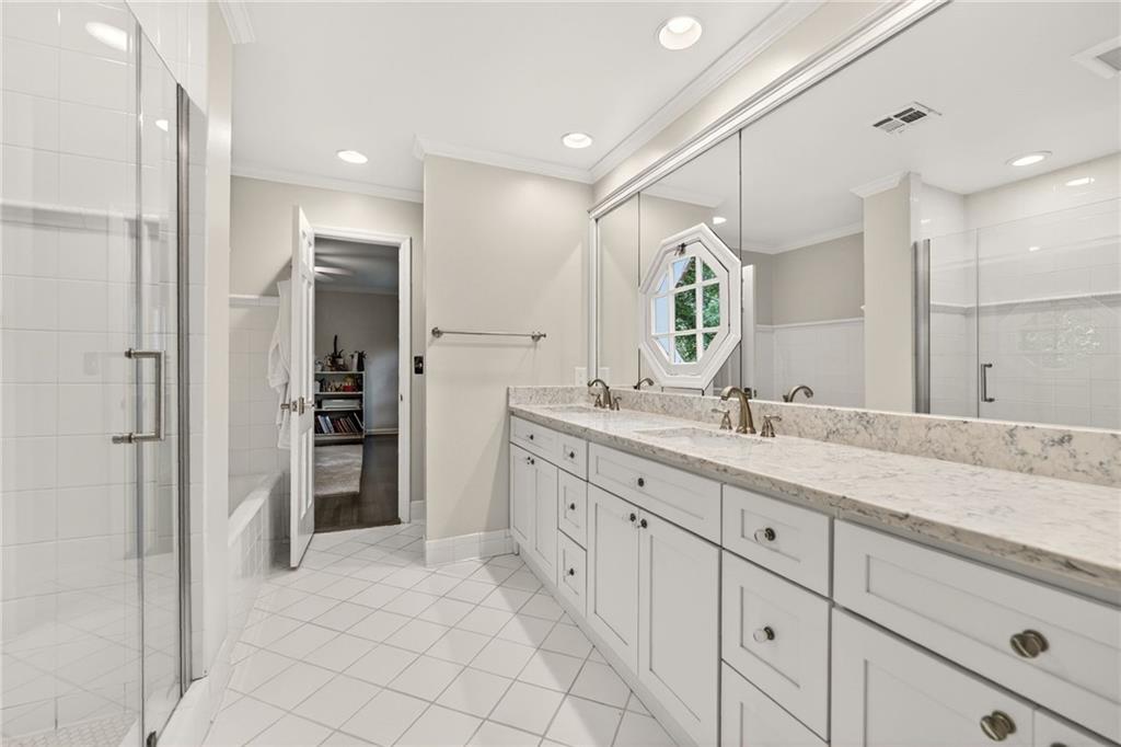 3650 Dumbarton Road Northwest Atlanta, GA 30327 - Photo 30 of 57 a bathroom with a granite countertop sink mirror and double