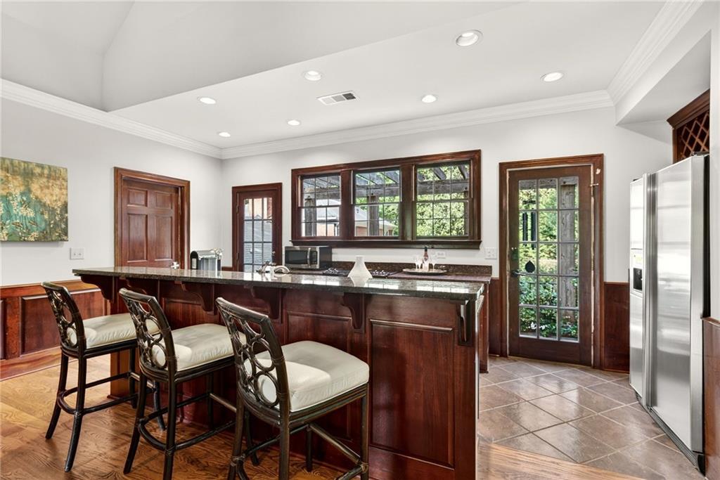 3650 Dumbarton Road Northwest Atlanta, GA 30327 - Photo 42 of 57 a dining table with chairs and window