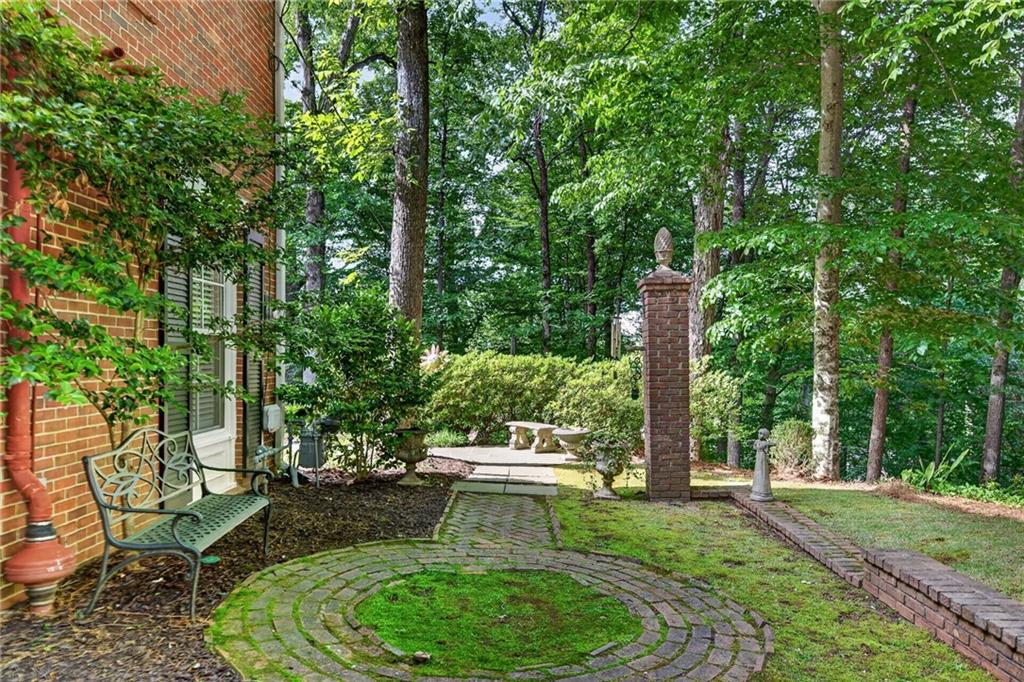 3650 Dumbarton Road Northwest Atlanta, GA 30327 - Photo 53 of 57 a view of a backyard with sitting area