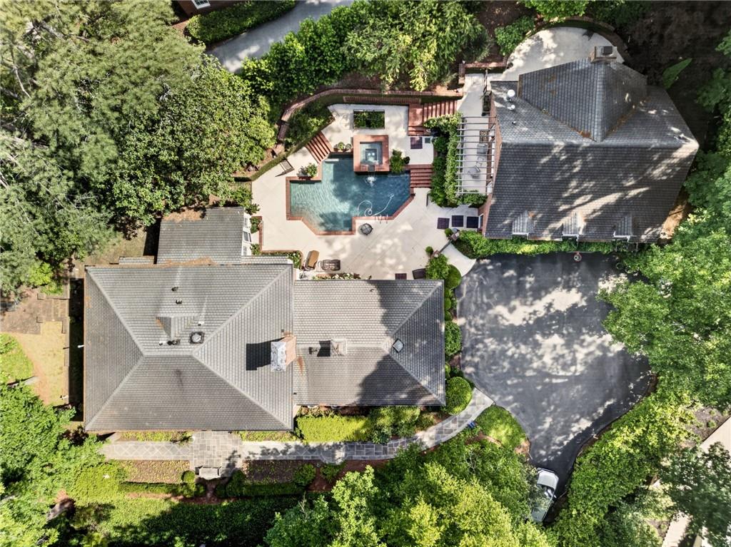 3650 Dumbarton Road Northwest Atlanta, GA 30327 - Photo 56 of 57 an aerial view of residential houses with outdoor space and trees