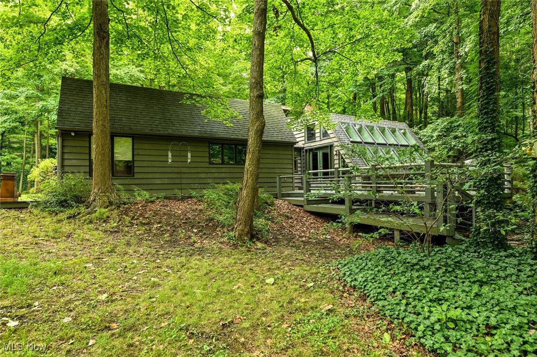 7061 Cascade Road Painesville, OH 44077 - Photo 4 of 49 Back of property featuring a wooden deck