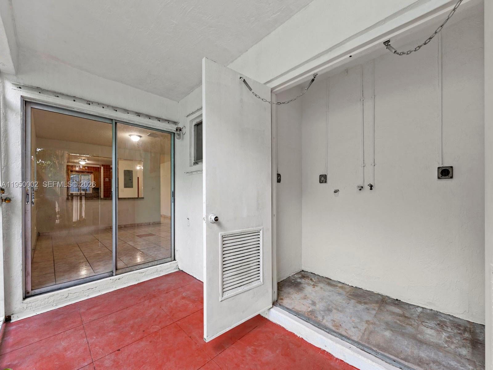 11075 Southwest 221st Terrace Miami, FL 33170 - Photo 19 of 31 a view of entryway with wooden floor