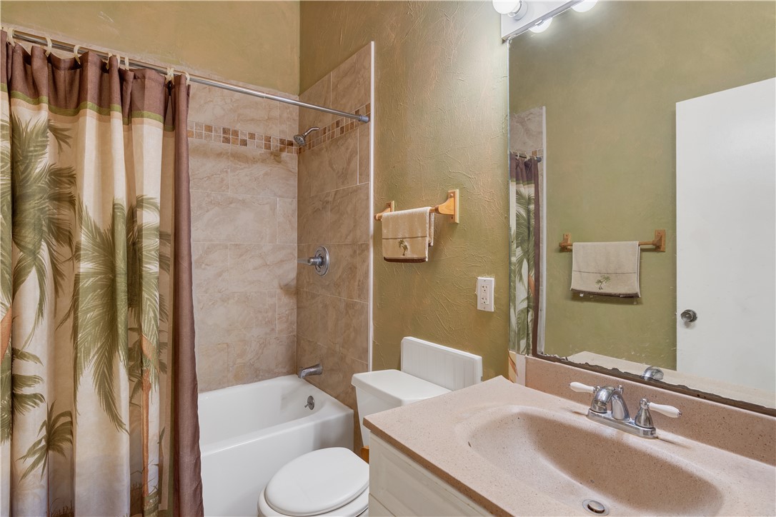 422 Del Monte Road Sebastian, FL 32958 - Photo 32 of 35 a bathroom with a sink toilet and shower