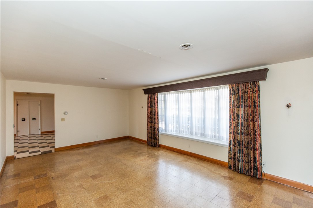 45 Amherst Road Cranston, RI 02920 - Photo 6 of 47 Over-sized Living Room with plenty of natural light and cork flooring
