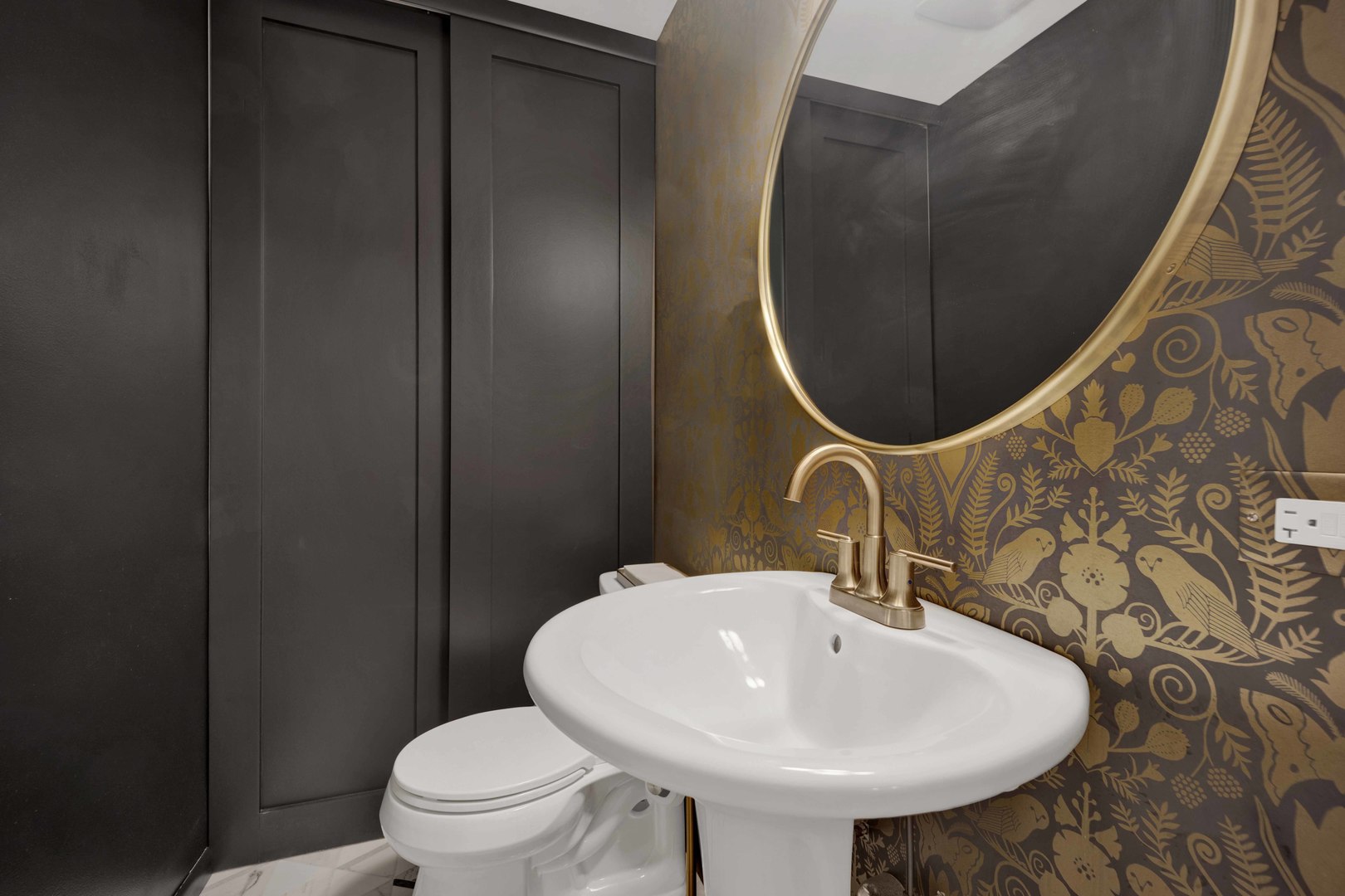 223 West Wisconsin Street, Unit 3A Chicago, IL 60614 - Photo 11 of 27 a bathroom with a sink and a mirror