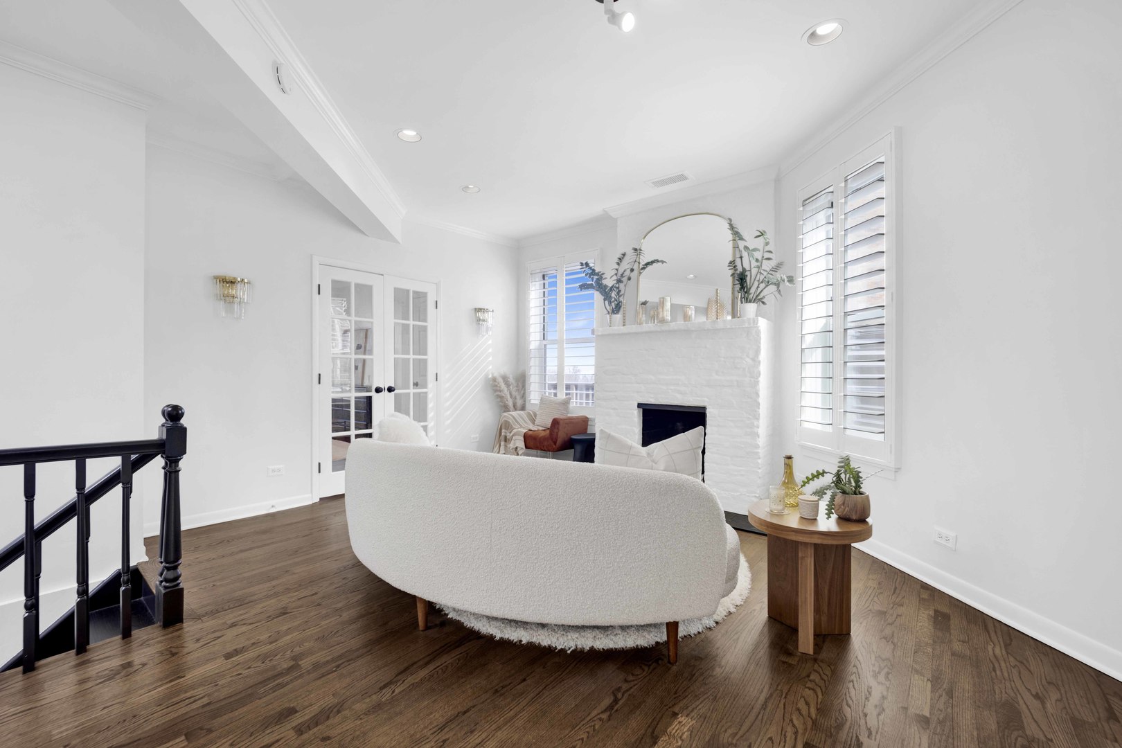223 West Wisconsin Street, Unit 3A Chicago, IL 60614 - Photo 15 of 27 a living room with furniture a fireplace and wooden floor