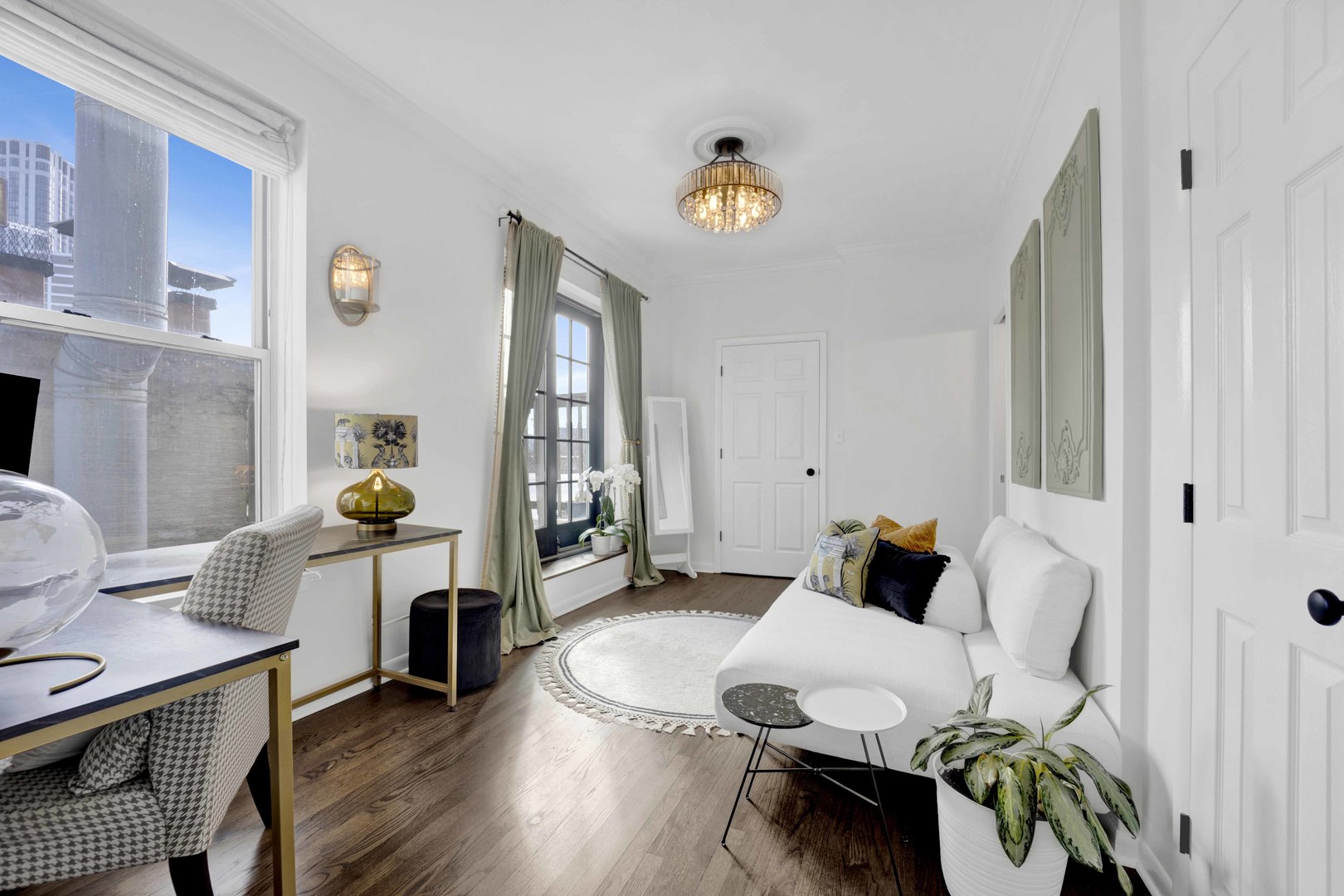 223 West Wisconsin Street, Unit 3A Chicago, IL 60614 - Photo 18 of 27 a living room with furniture and a wooden floor