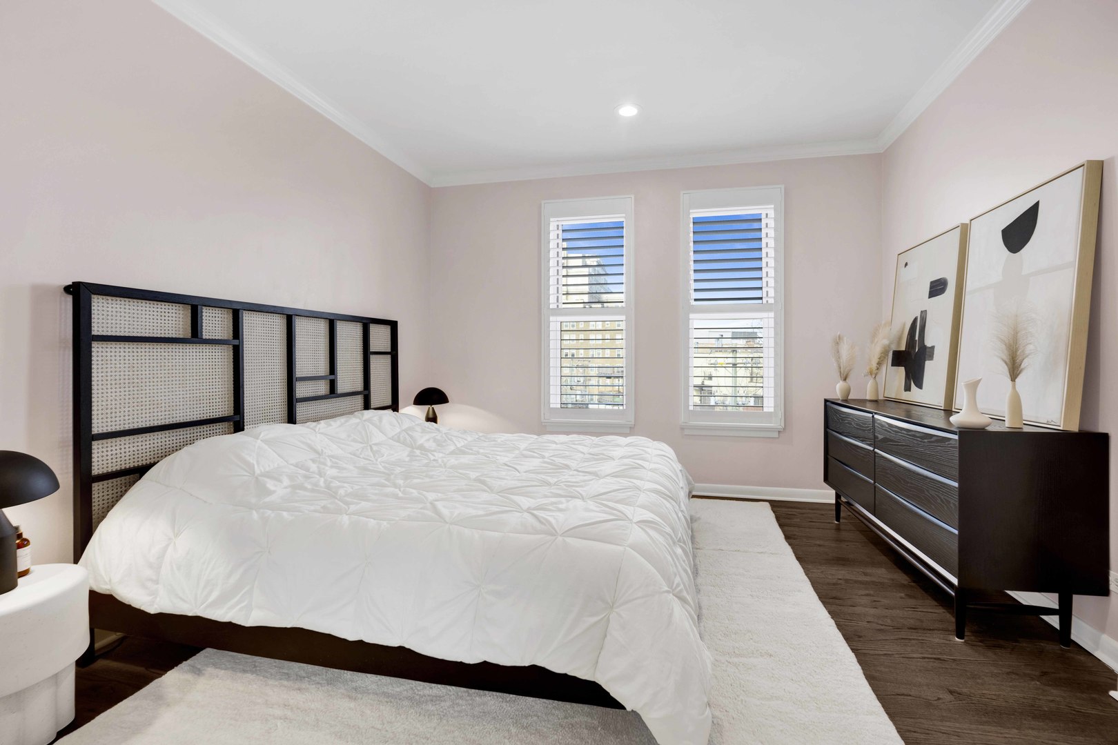 223 West Wisconsin Street, Unit 3A Chicago, IL 60614 - Photo 21 of 27 a bed sitting in a bedroom next to a window