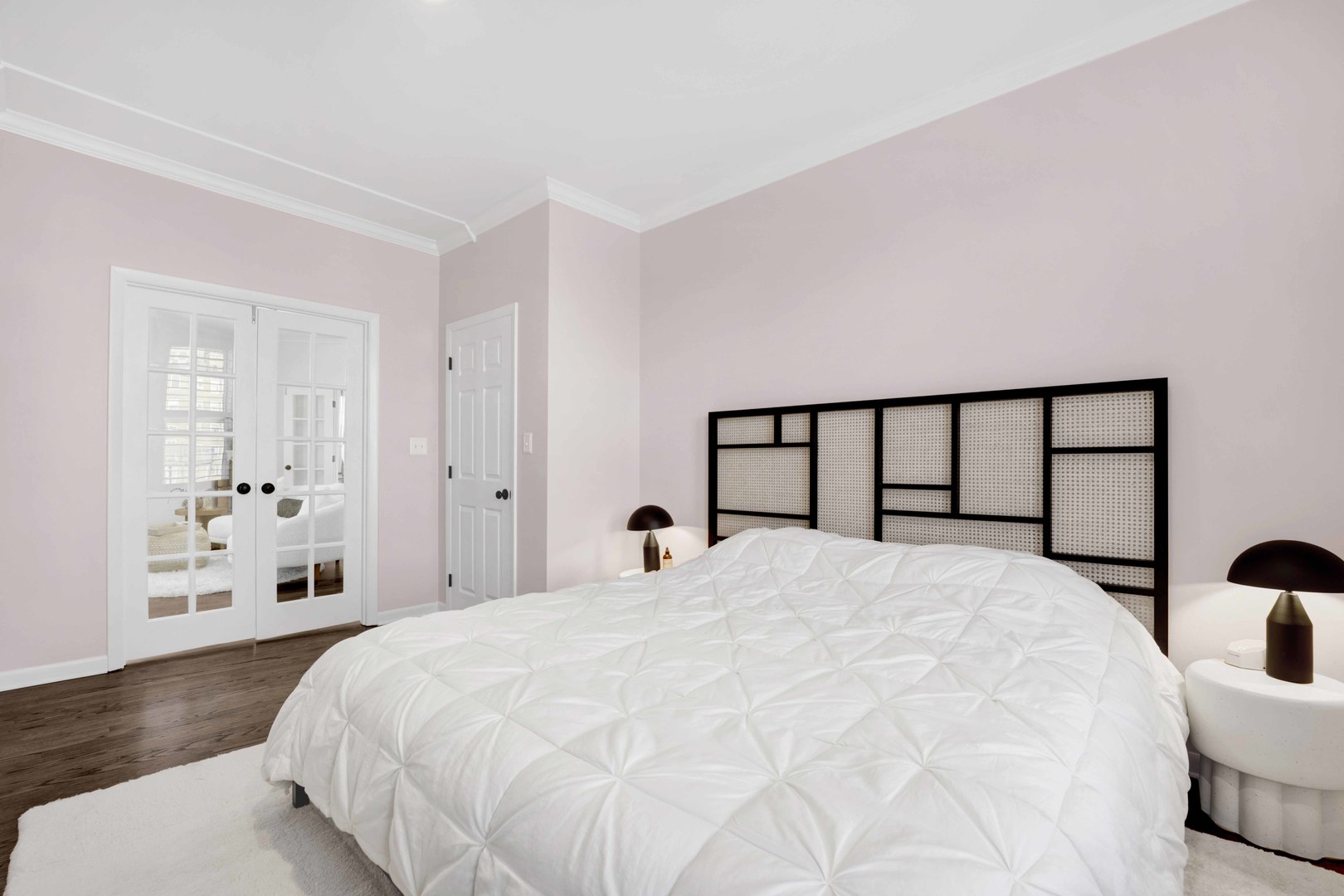 223 West Wisconsin Street, Unit 3A Chicago, IL 60614 - Photo 22 of 27 a bedroom with a large bed and a large window