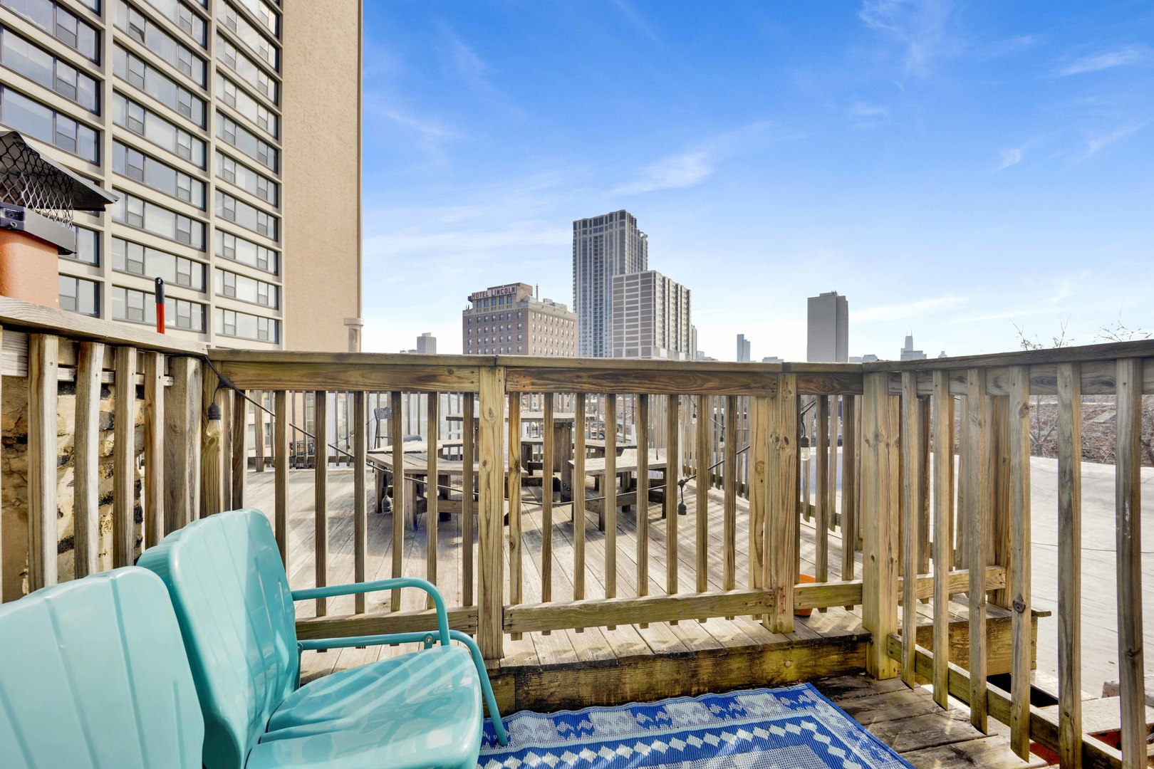 223 West Wisconsin Street, Unit 3A Chicago, IL 60614 - Photo 25 of 27 a view of a balcony with wooden floor
