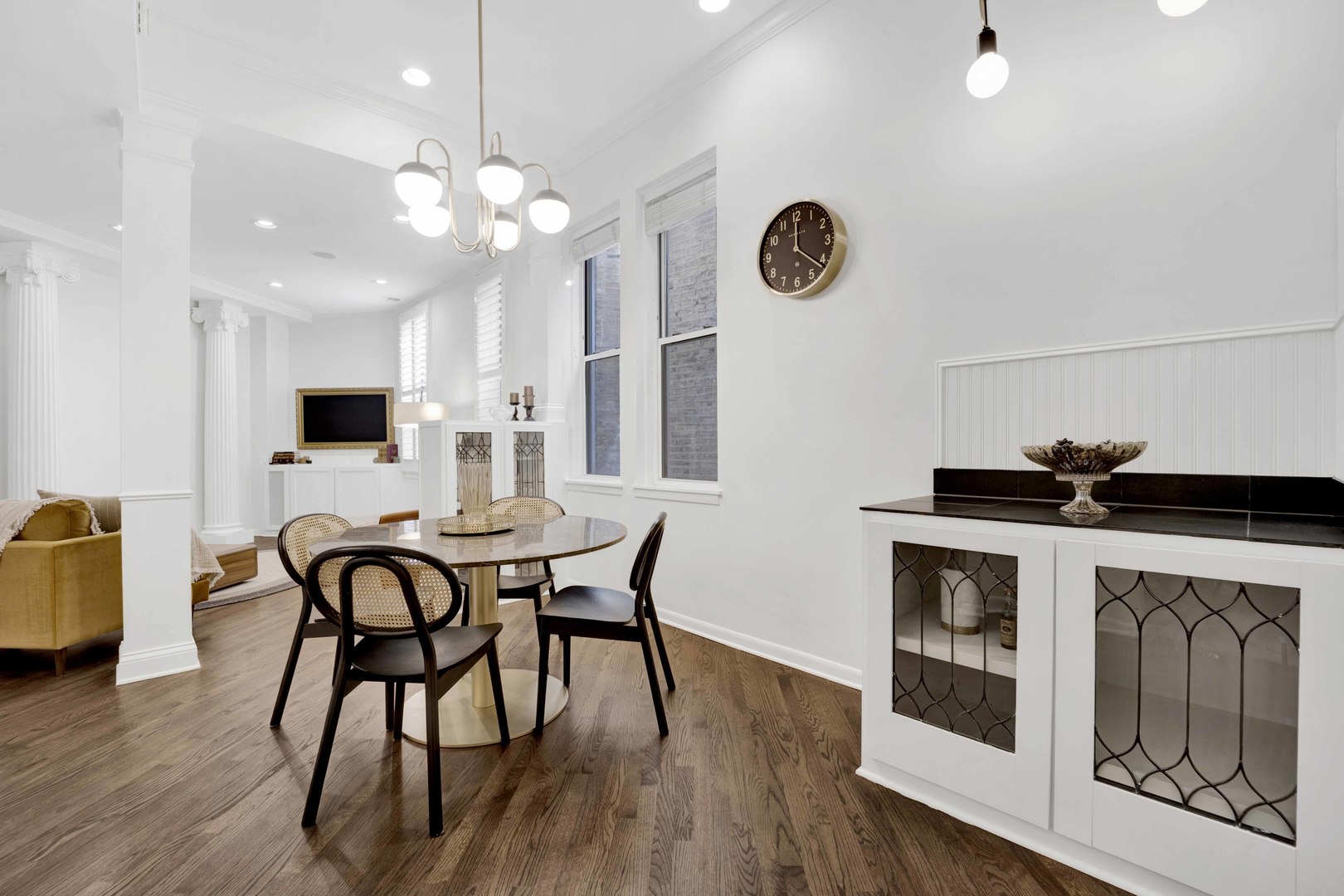 223 West Wisconsin Street, Unit 3A Chicago, IL 60614 - Photo 9 of 27 a view of a dining room with furniture and wooden floor