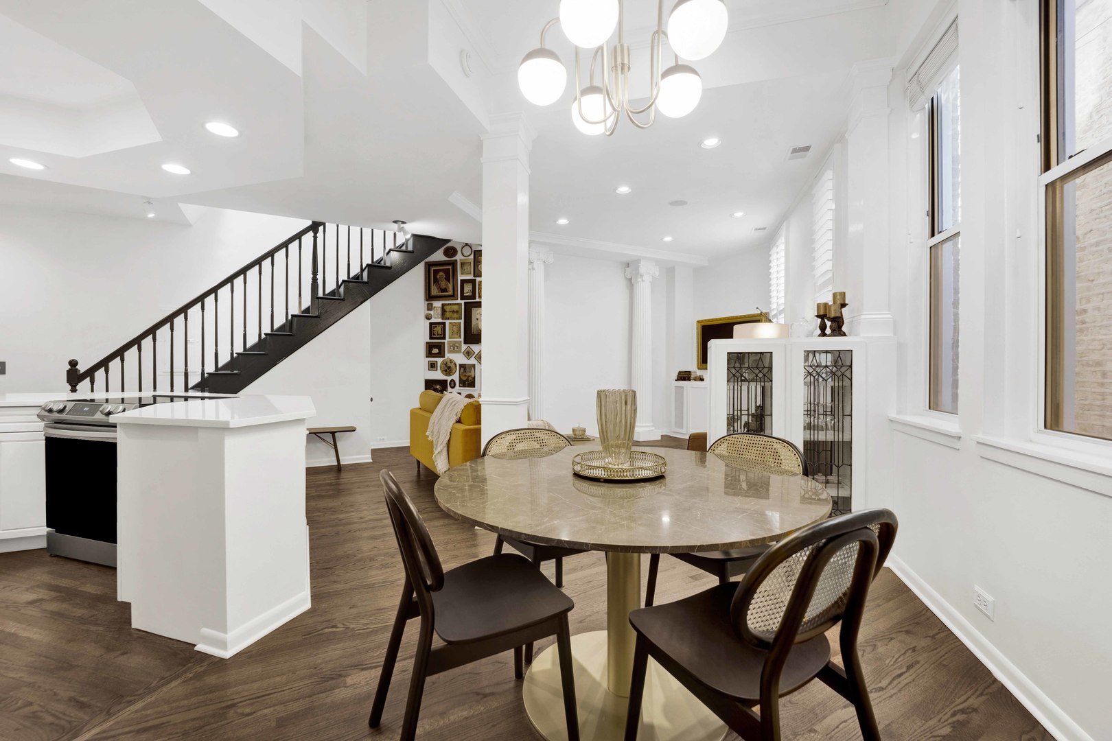 223 West Wisconsin Street, Unit 3A Chicago, IL 60614 - Photo 10 of 27 a view of a dining room with furniture and wooden floor