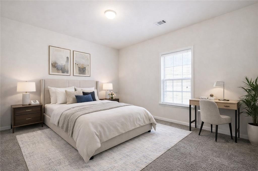 3155 Esplanade Circle Southwest Atlanta, GA 30311 - Photo 16 of 23 a bedroom with a bed and a desk