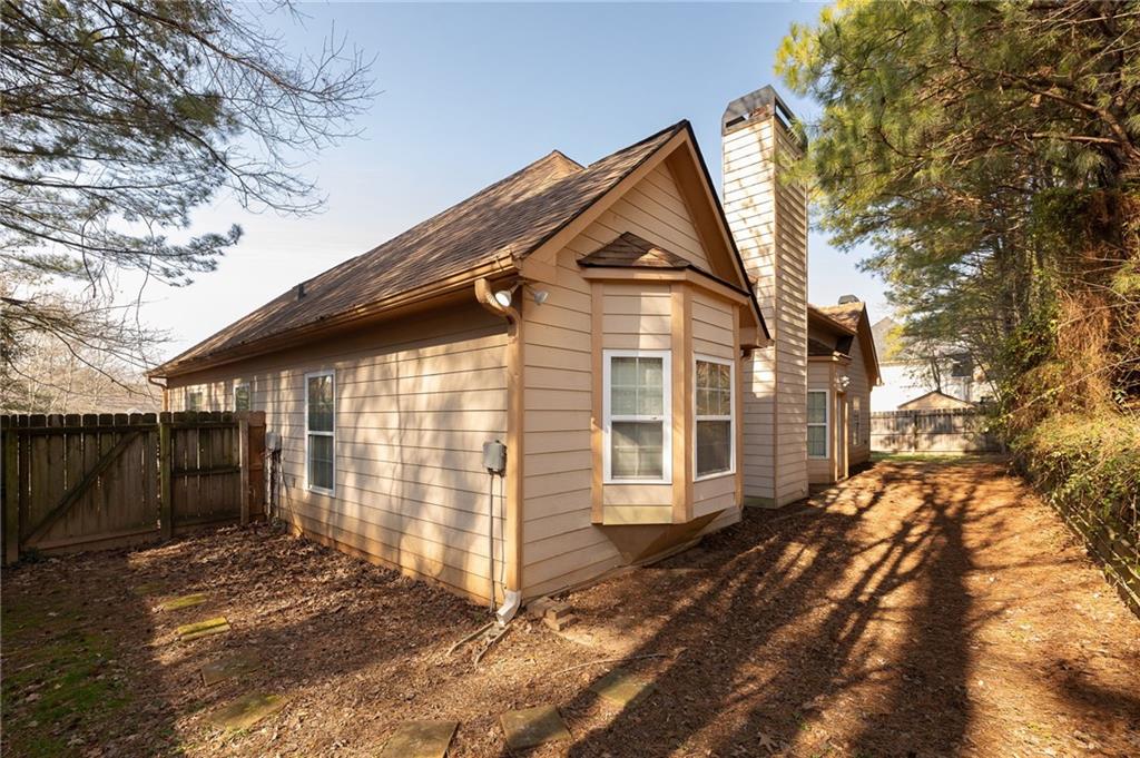 3155 Esplanade Circle Southwest Atlanta, GA 30311 - Photo 18 of 23 a view of a house with a yard