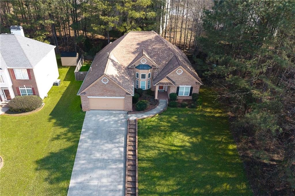 3155 Esplanade Circle Southwest Atlanta, GA 30311 - Photo 23 of 24 a aerial view of a house with a yard table and chairs