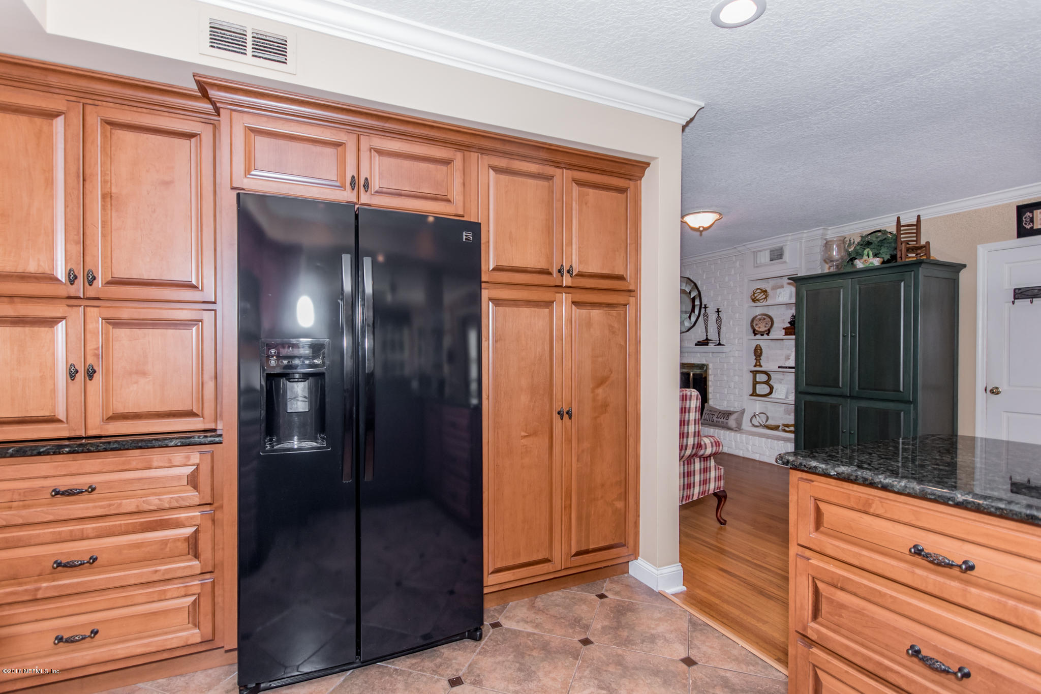 9425 Conifer Road Jacksonville, FL 32257 - Photo 26 of 46 Kitchen to Living Room
