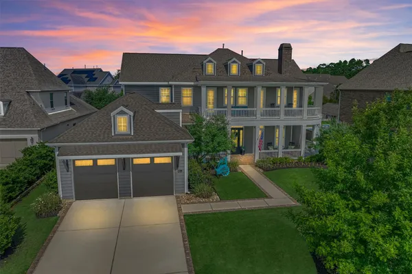 a front view of a house with yard