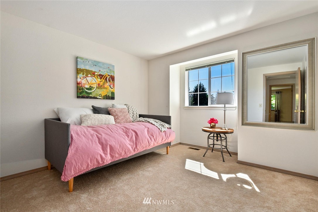 3225 208th Place Southeast Bothell, WA 98021 - Photo 18 of 28 a bedroom with bed and window