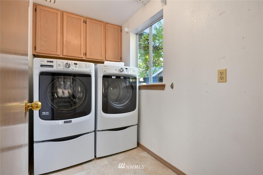 3225 208th Place Southeast Bothell, WA 98021 - Photo 20 of 28 a utility room with dryer and washer