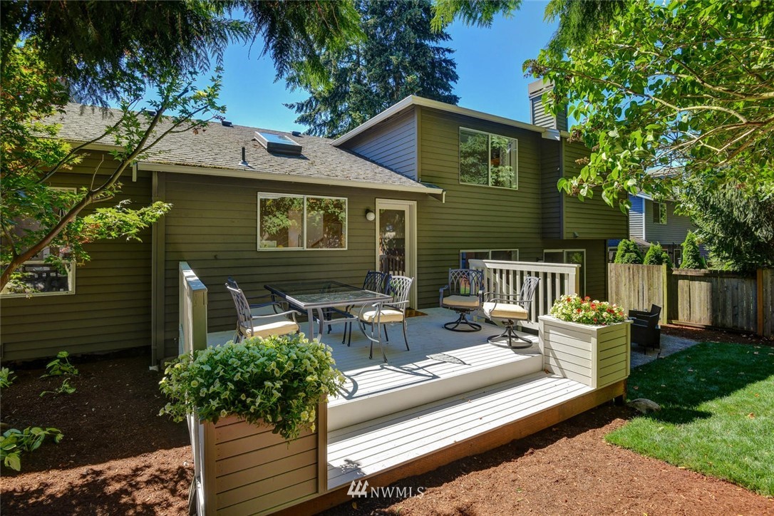 3225 208th Place Southeast Bothell, WA 98021 - Photo 23 of 28 a view of a house with backyard and sitting area