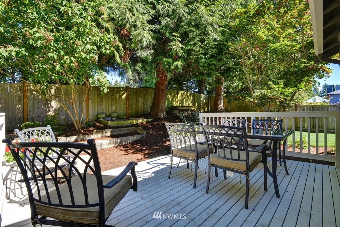 3225 208th Place Southeast Bothell, WA 98021 - Photo 24 of 28 a view of a chairs and table on the deck