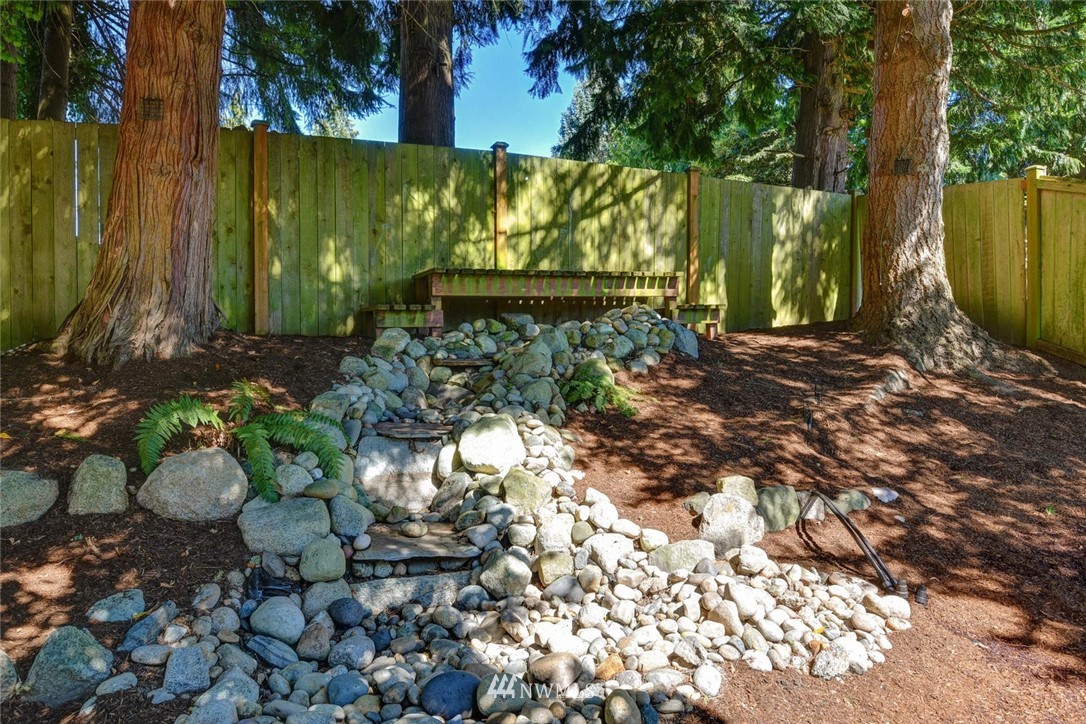 3225 208th Place Southeast Bothell, WA 98021 - Photo 25 of 28 a view of a tree with back yard