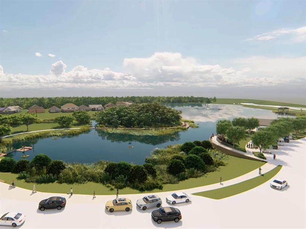 2002 Rose Hill Road Carrollton, TX 75007 - Photo 33 of 34 a view of a lake with a car parked