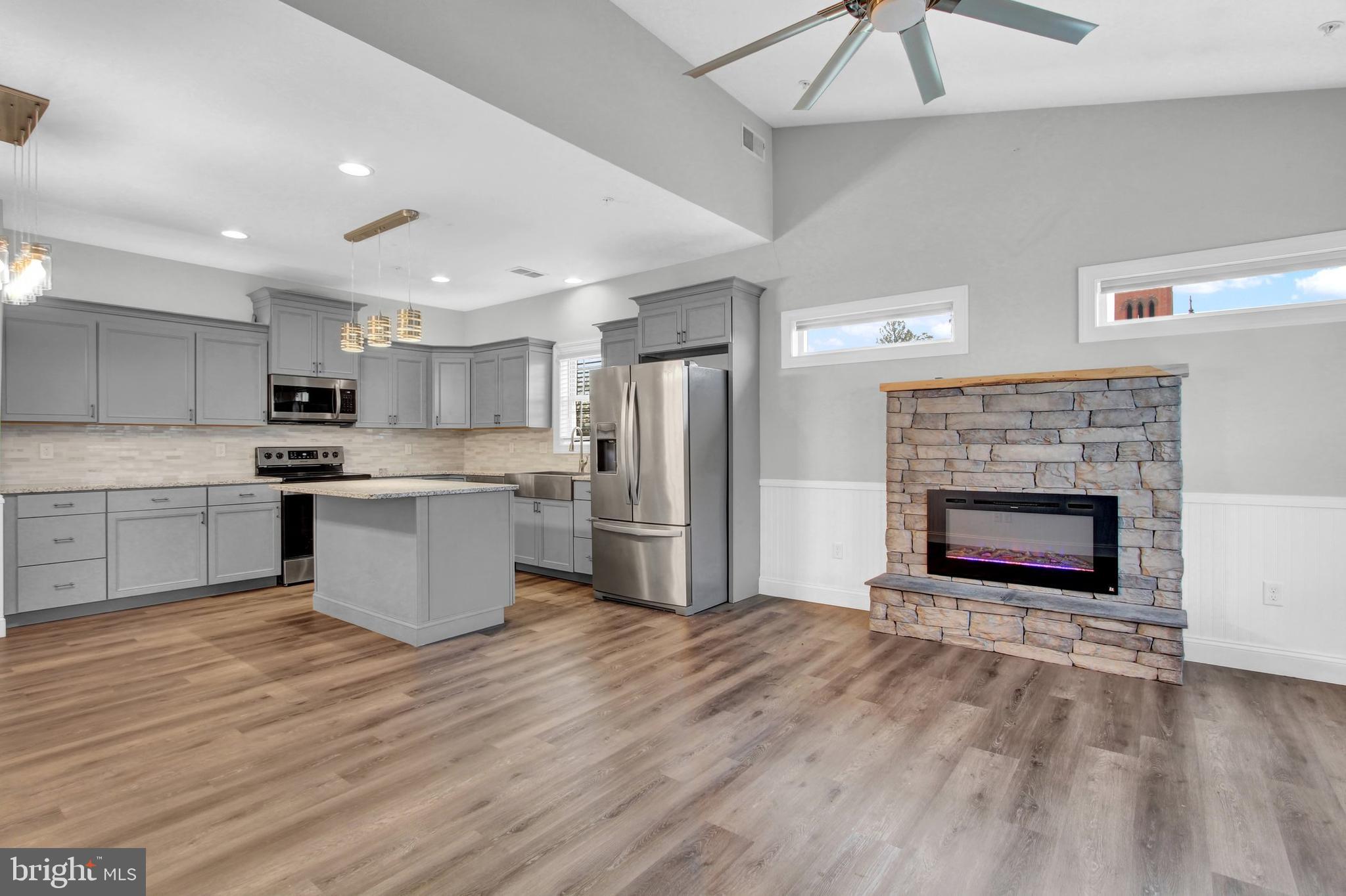 180 3rd Street Hanover, PA 17331 - Photo 4 of 21 Fireplace and Kitchen View