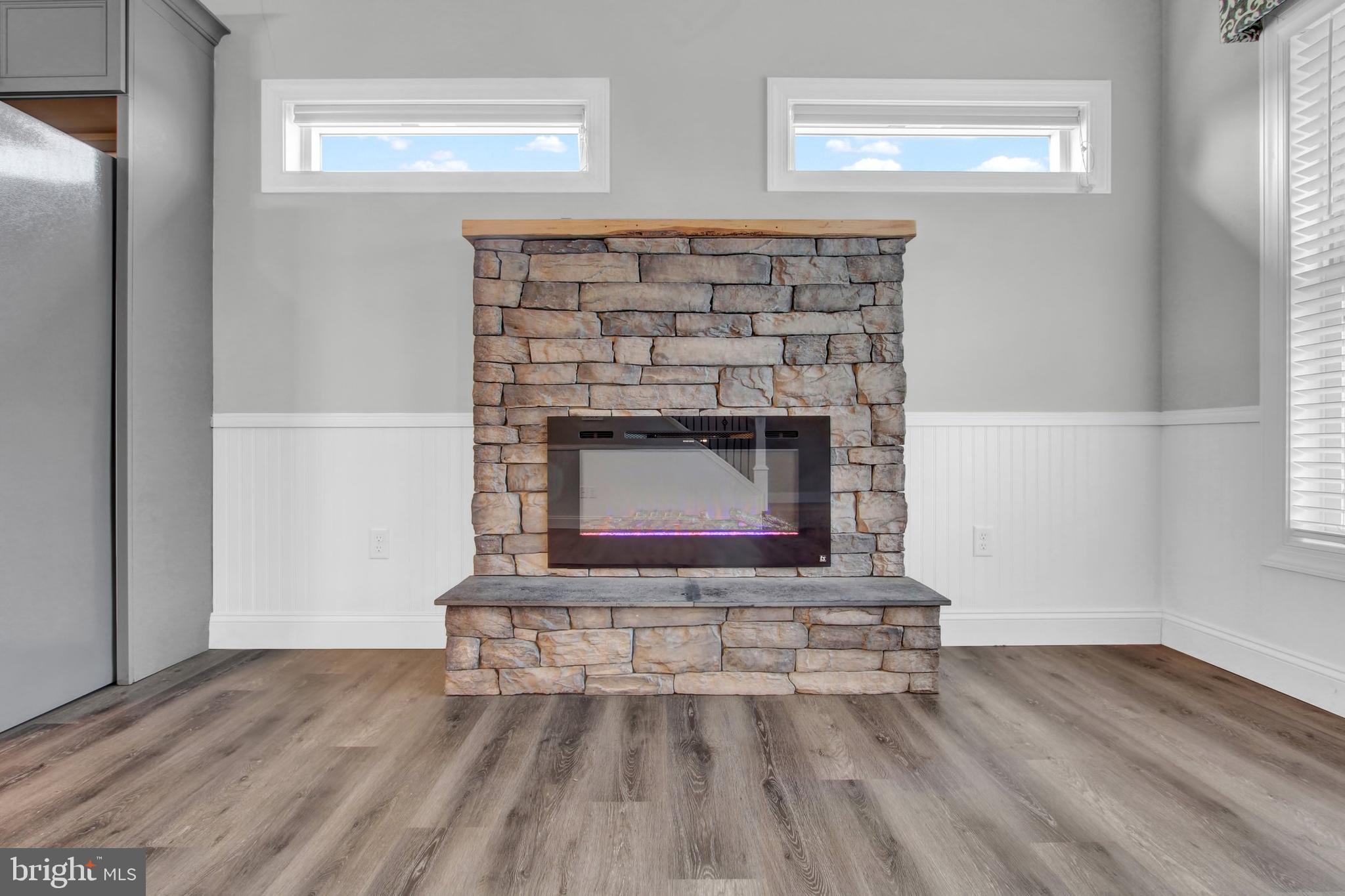 180 3rd Street Hanover, PA 17331 - Photo 5 of 21 Family room stone Fireplace with wainscoting