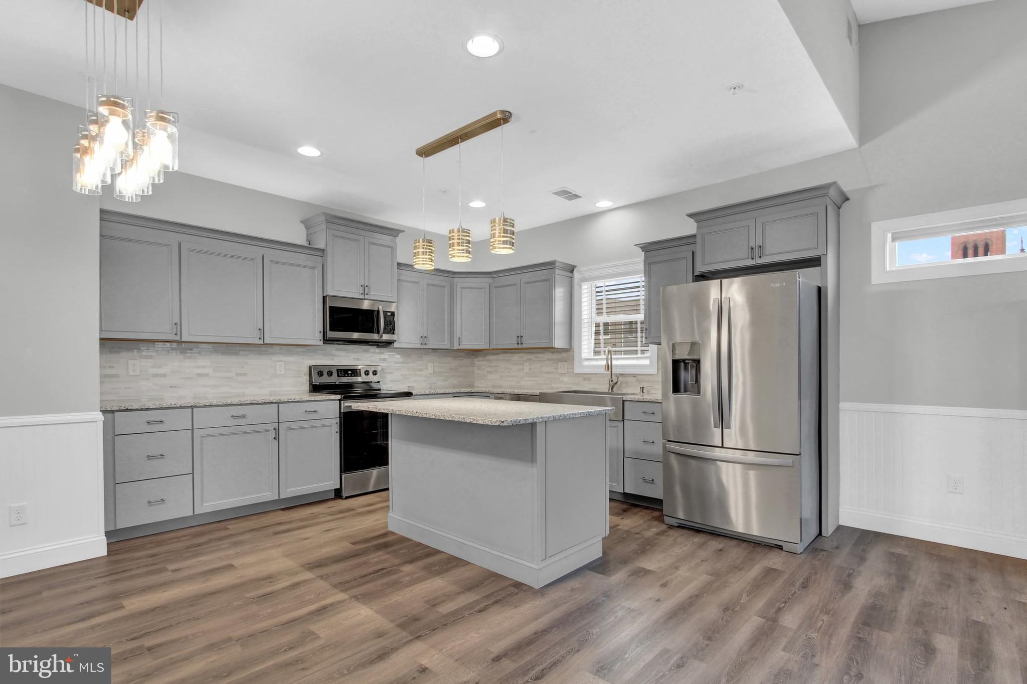 180 3rd Street Hanover, PA 17331 - Photo 7 of 21 LVP Floors, recessed lights, Stainless appliances