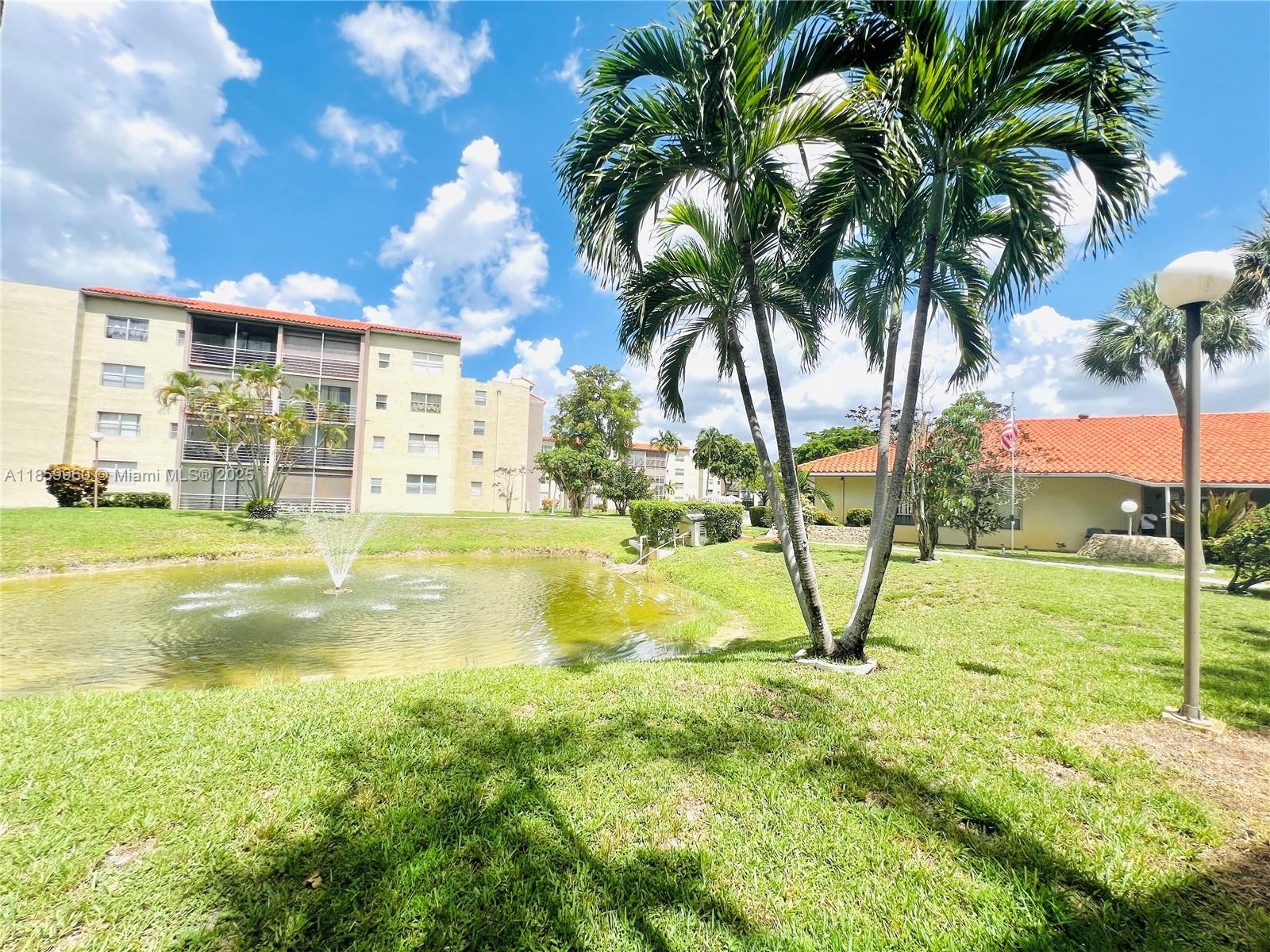 1810 Southwest 81st Avenue, Unit 2201 North Lauderdale, FL 33068 - Photo 17 of 32 a view of an ocean with palm trees