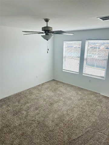 en empty room with windows