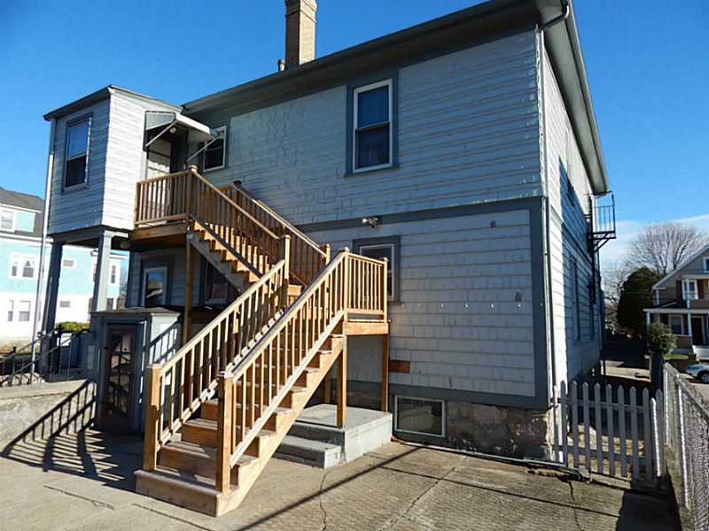 749 Grove Street Woonsocket, RI 02895 - Photo 5 of 15 Exterior Front. nice rear stairs