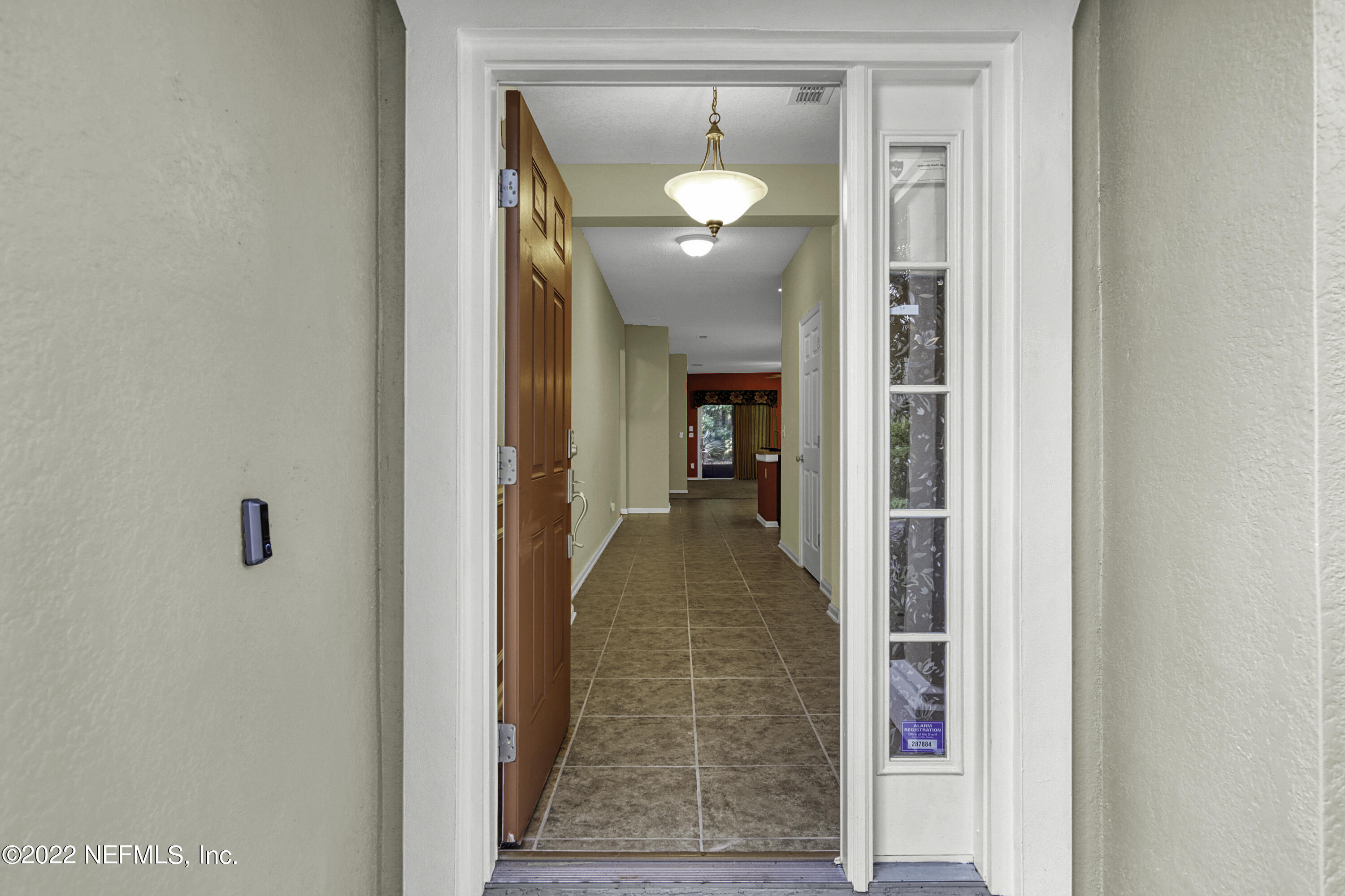 300 Auburn Oaks Road East Jacksonville, FL 32218 - Photo 2 of 15 a view of a hallway with a dining room