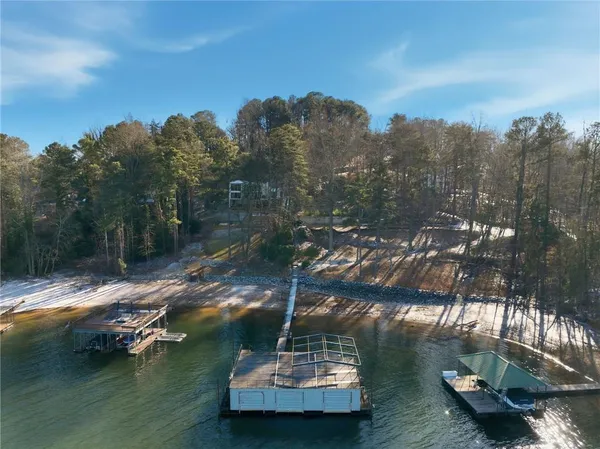 a view of a lake with a garden