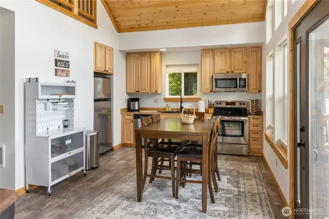a view of a dining room kitchen and a window