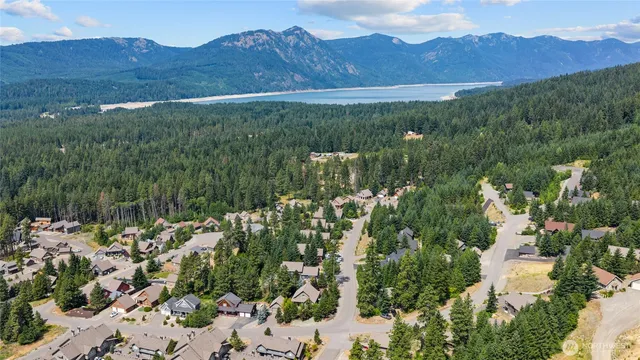 a view of a lush green hillside and a building