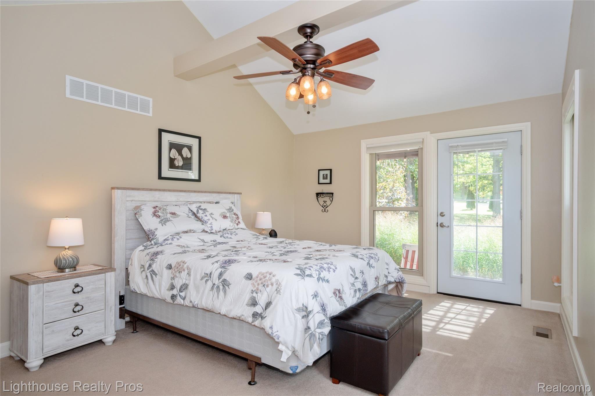 8773 Hyne Road Brighton, MI 48114 - Photo 19 of 38 Master bedroom with French door out onto the deck