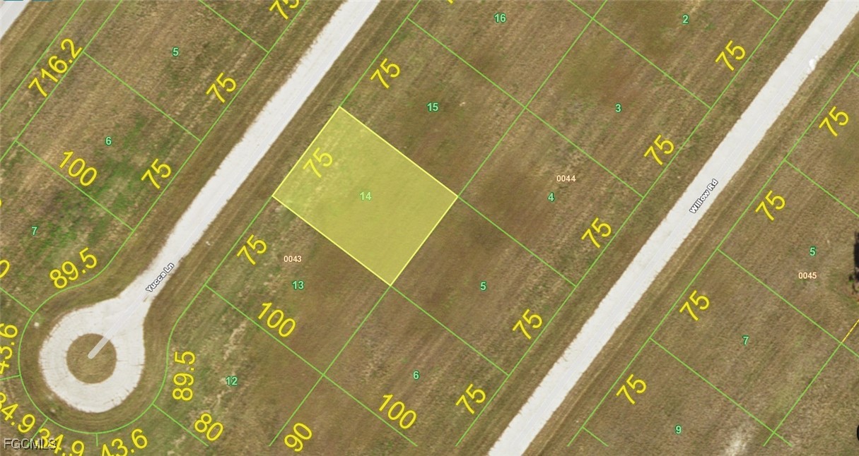 a blue sign that is on the wall of a building