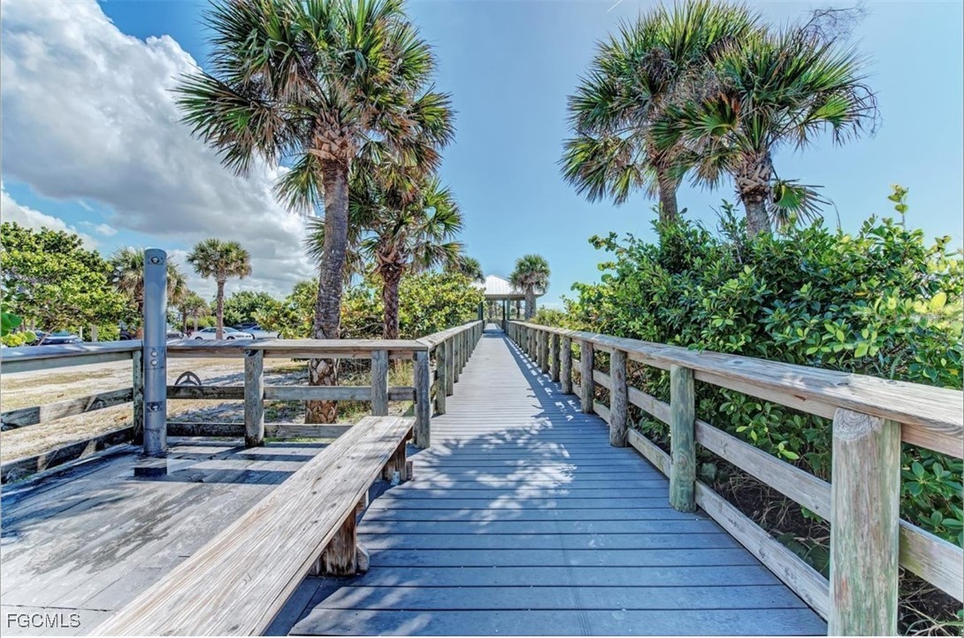10 Yucca Lane Placida, FL 33946 - Photo 15 of 26 a view of balcony with wooden floor and fence