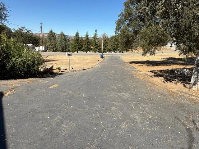 a view of a road with an outdoor space
