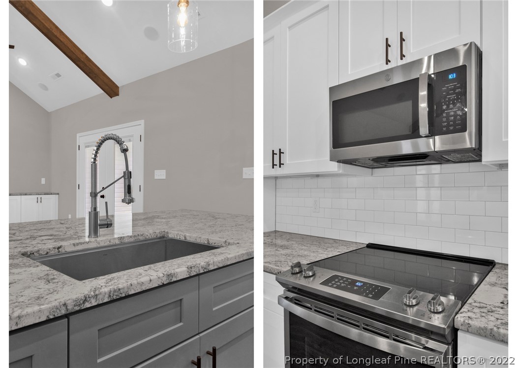 171 Mumford Road Raeford, NC 28376 - Photo 15 of 35 a kitchen with granite countertop a stove and a sink